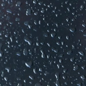 Waterdrops on dark backdrop
