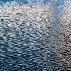 Blue water glitter background space for text