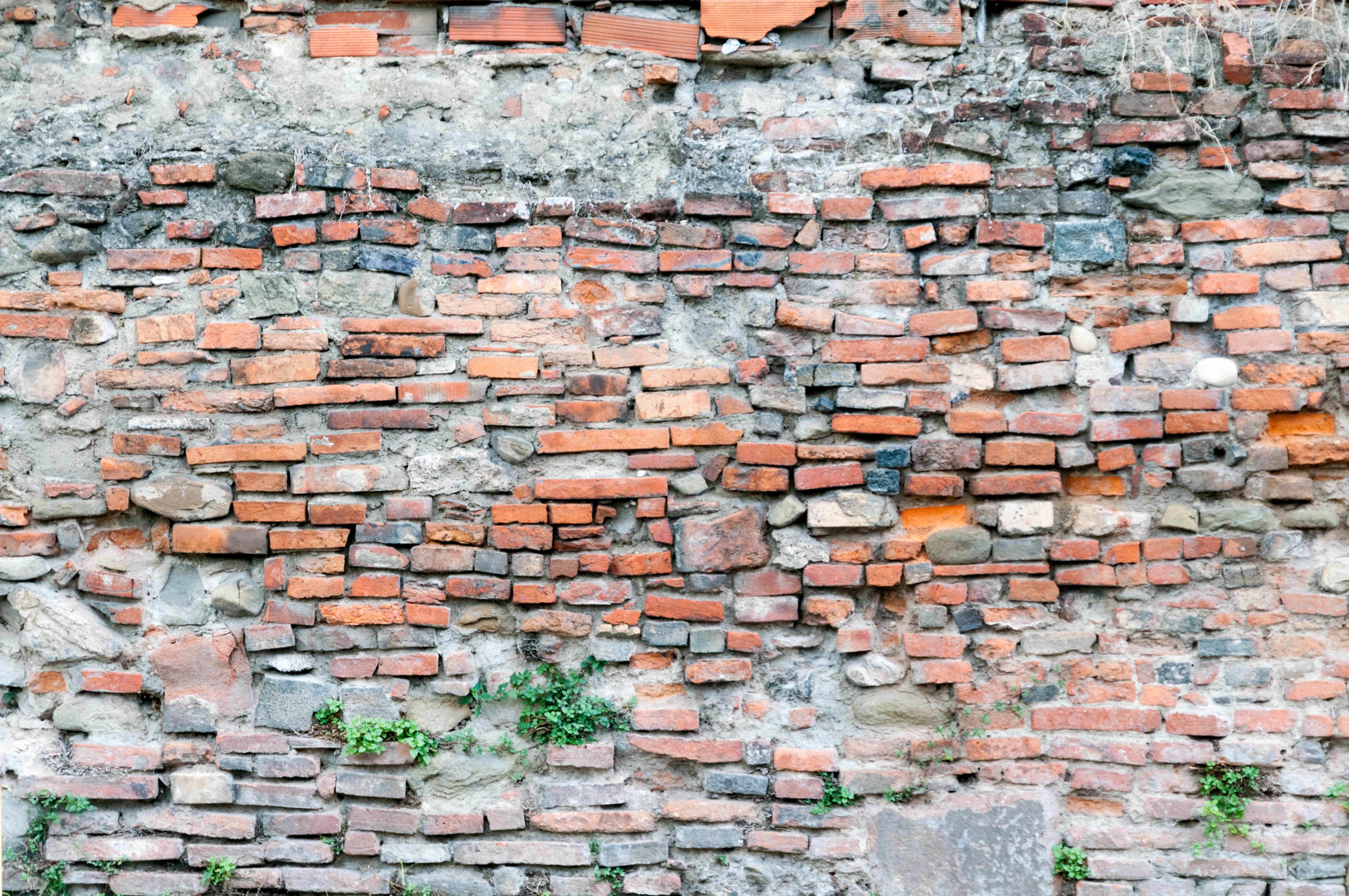 Badly stacked brick wall background