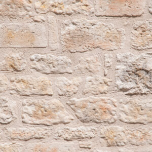 Big and small stones in cement