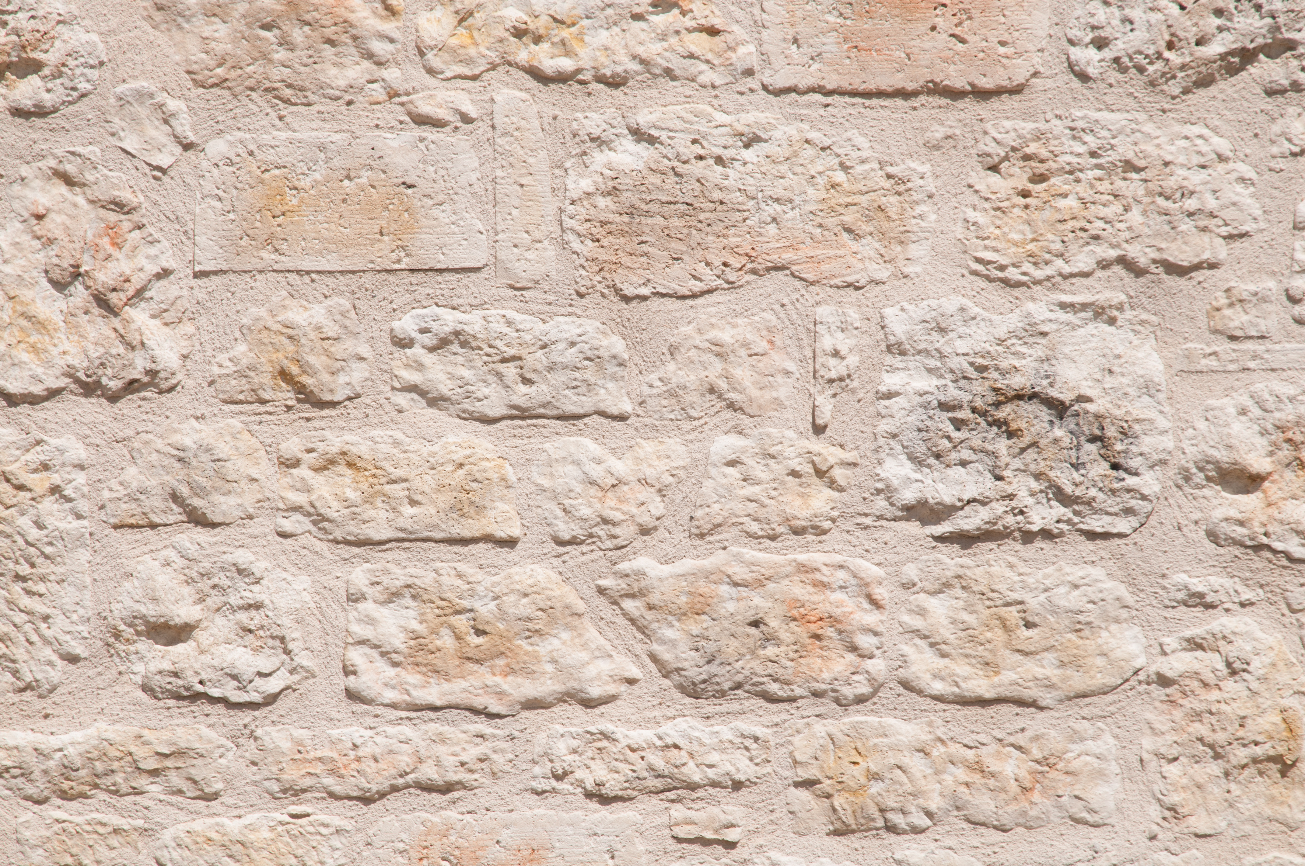 Big and small stones in cement