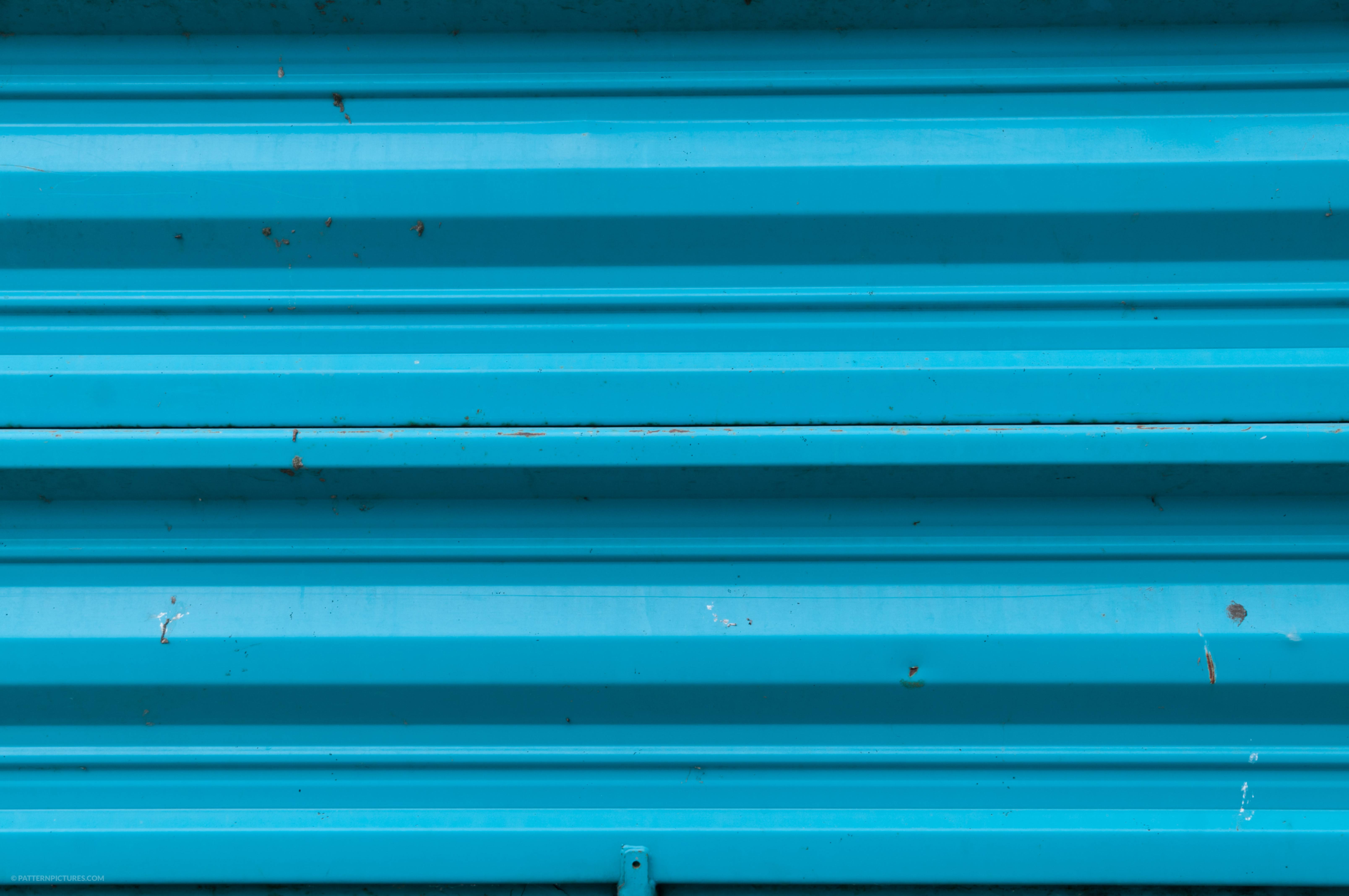 Blue metal wall background