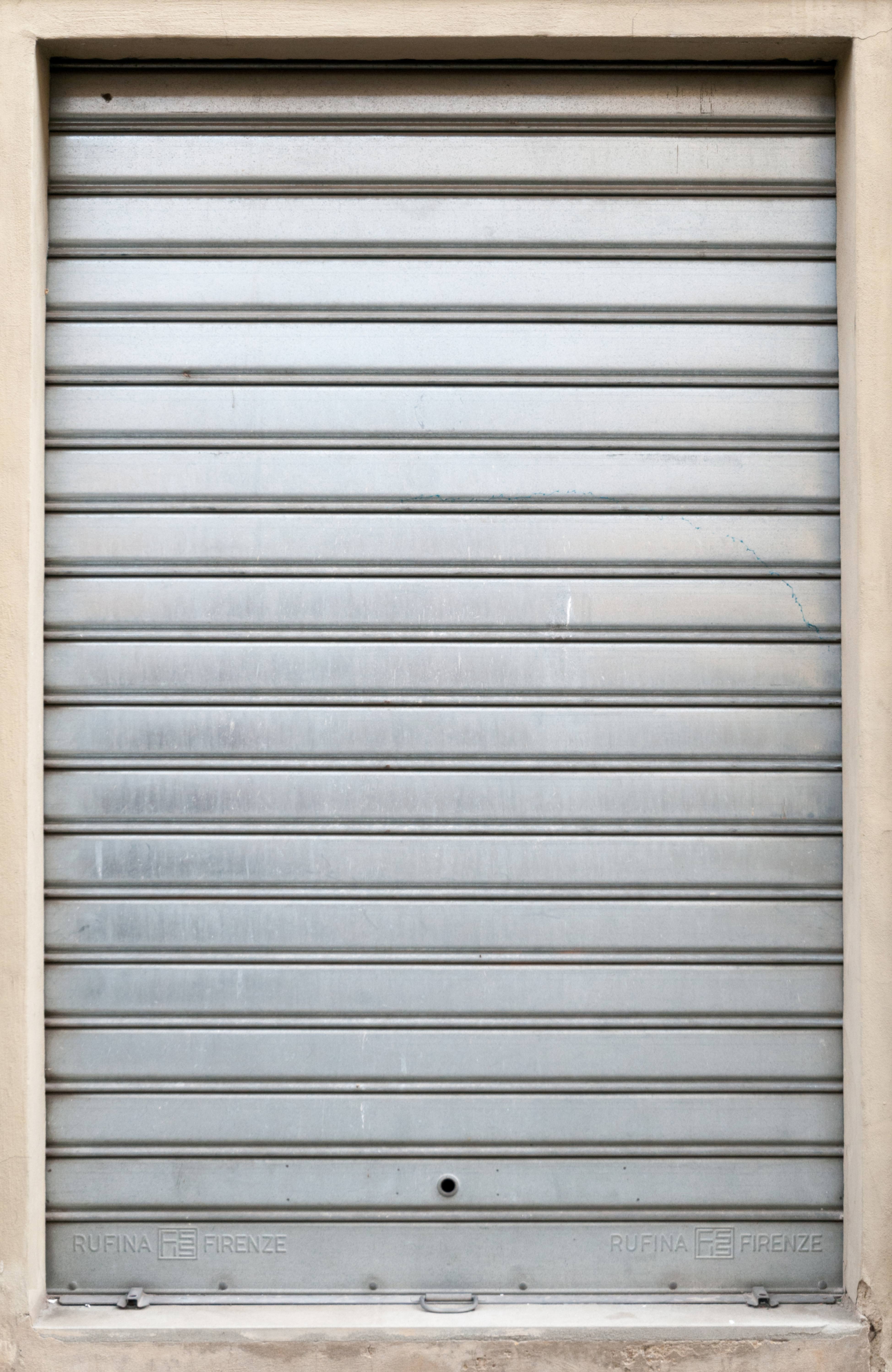 Closed metal shop shutter door