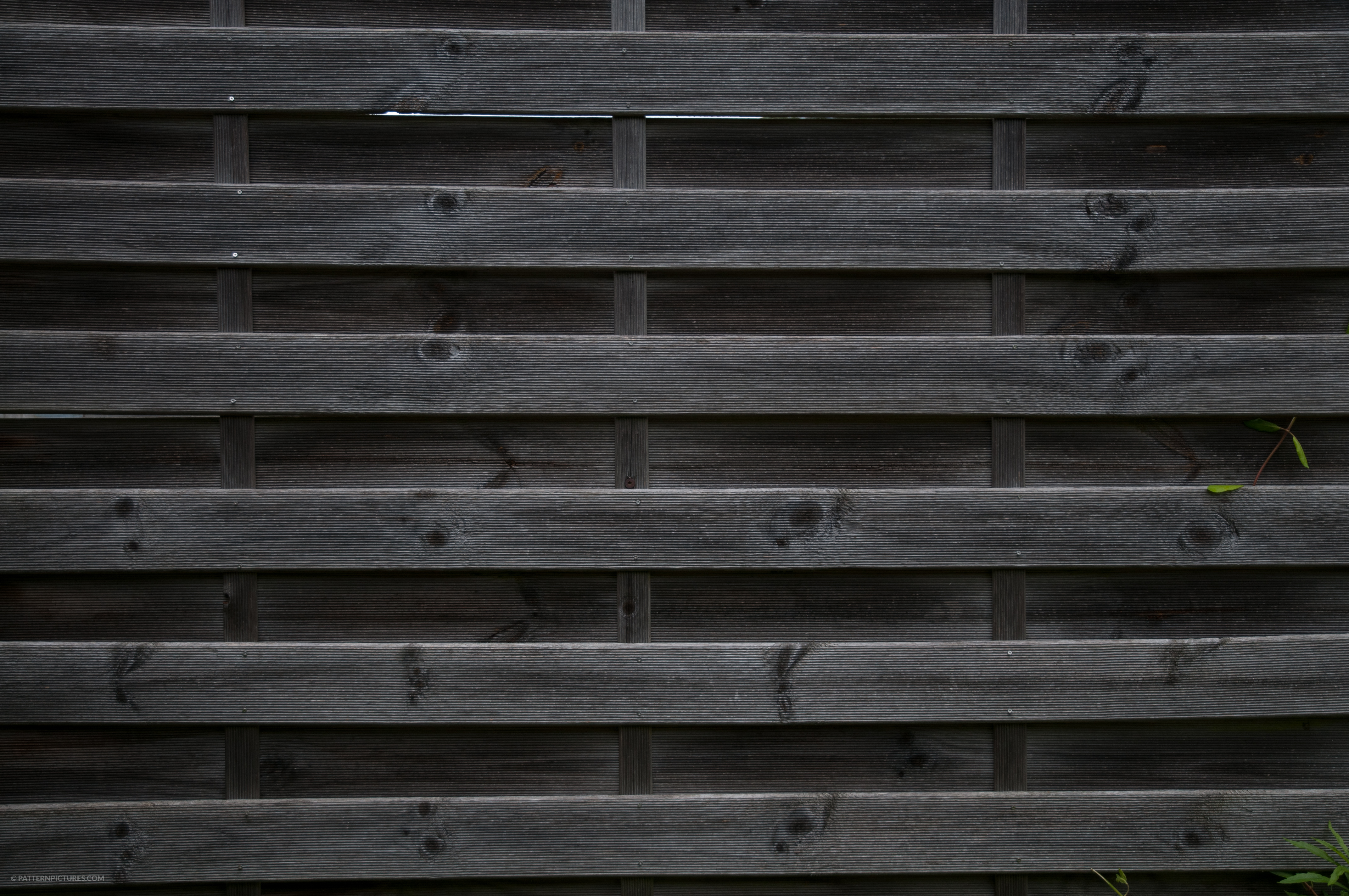Dark wooden fence background