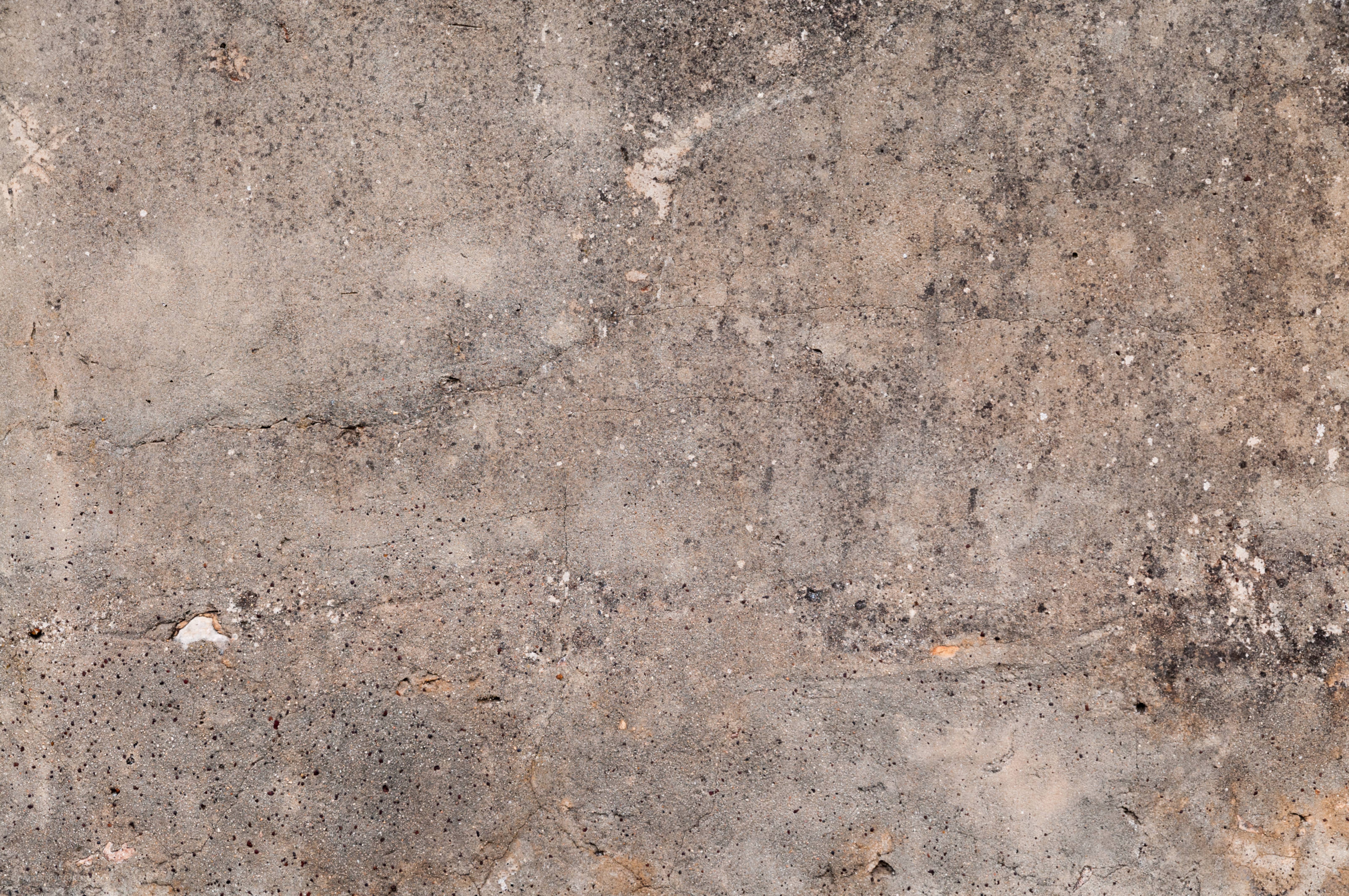 Dirt covered grunge cracked stone wall