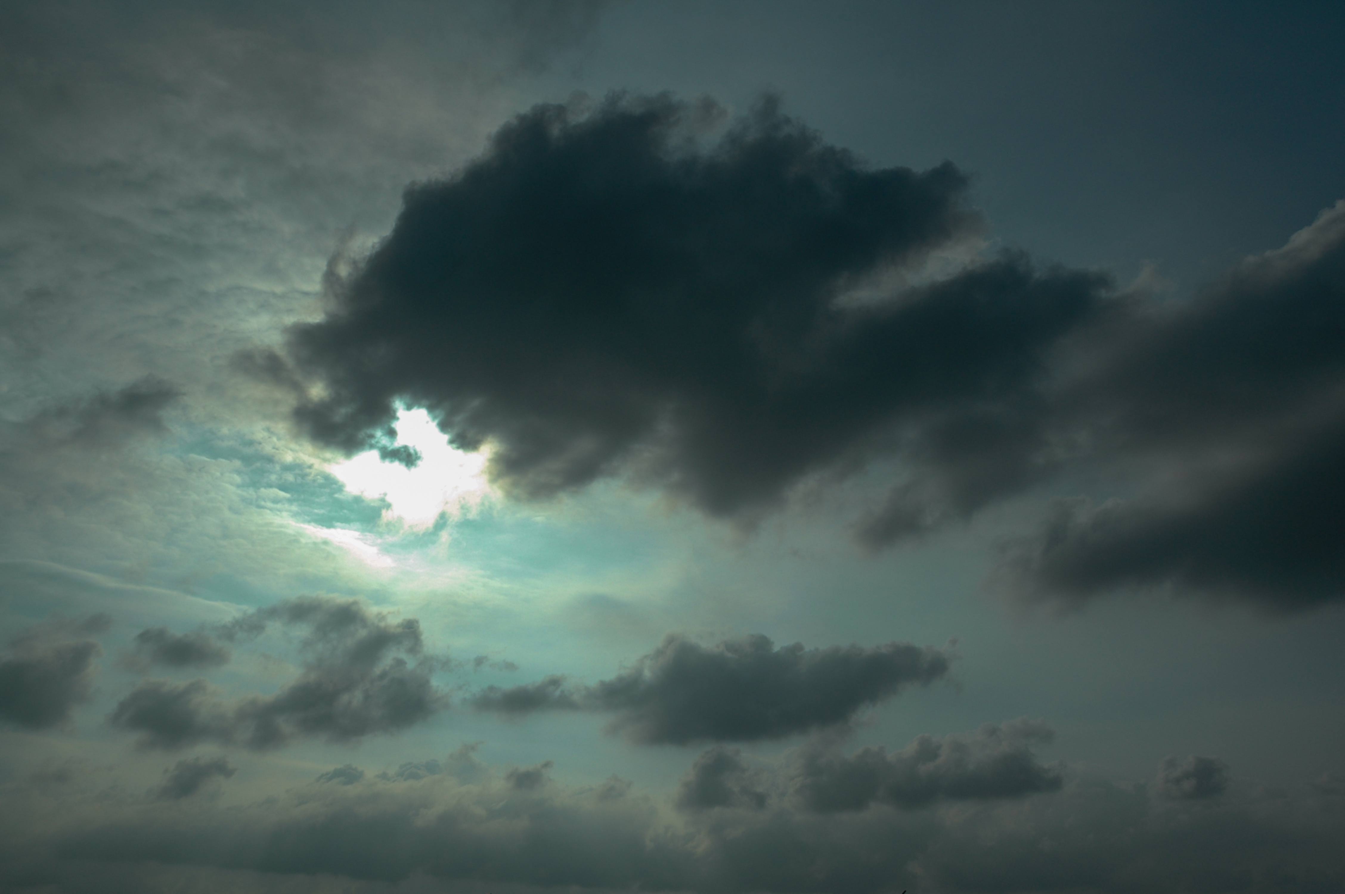 Dramatic Grey Sky with Sunlight and Dark Clouds