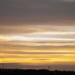Early Morning Yellow Sky Clouds and Sunlight