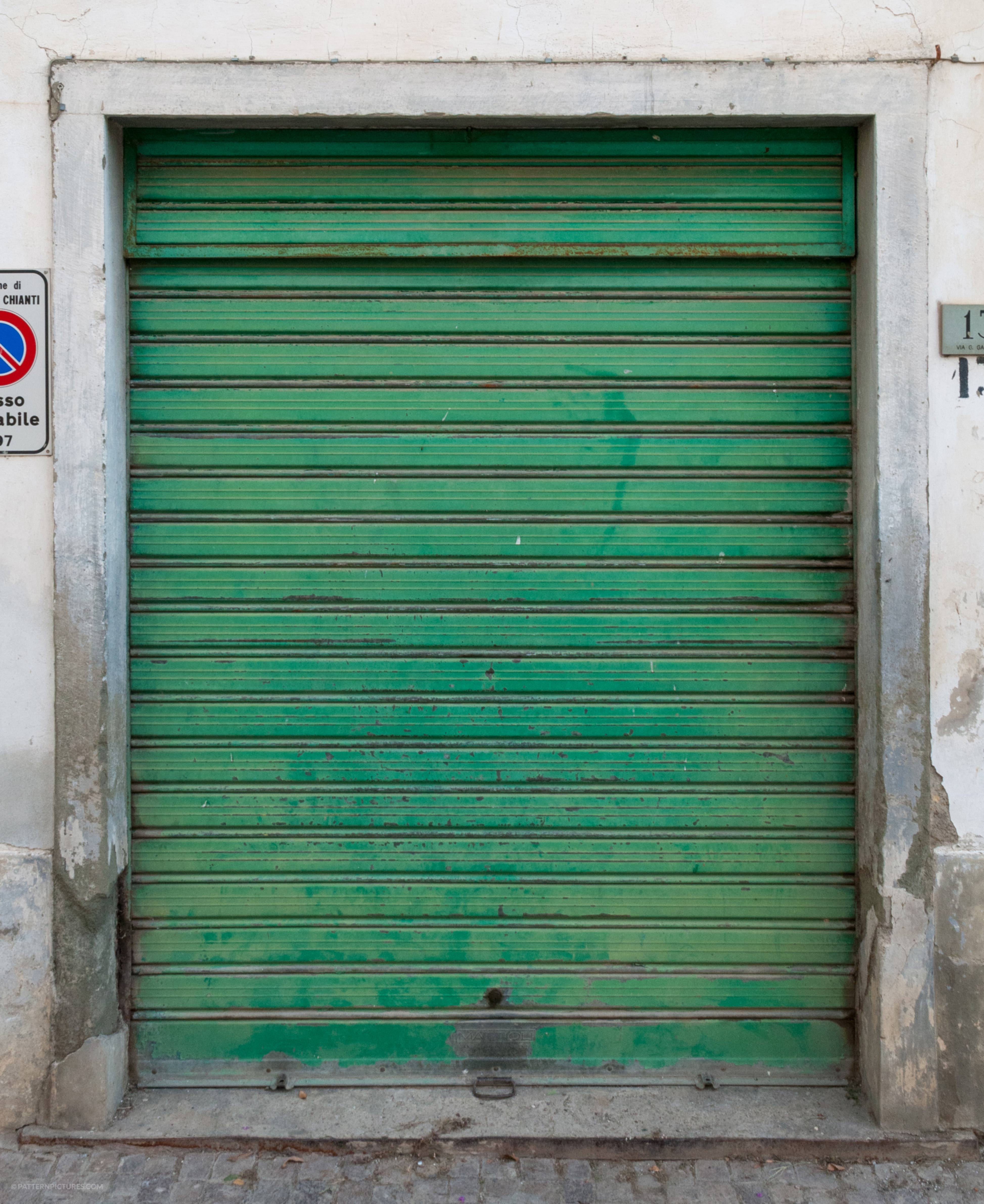 Green metal garage door background metal