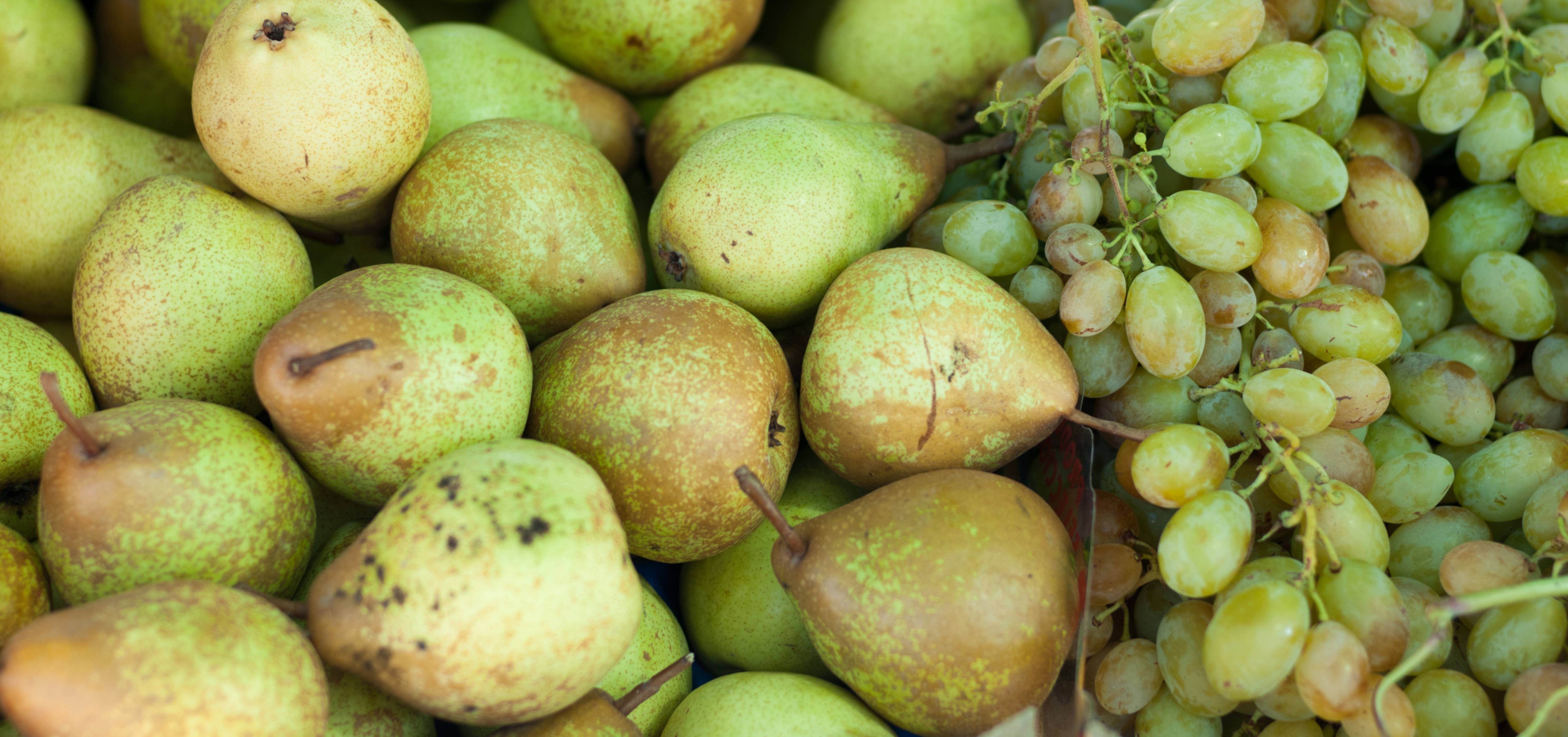 Green pears and grapes market fruit texture