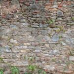 Grunge old stone brick wall texture