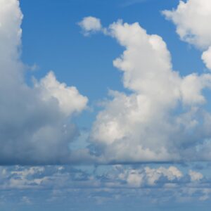 Low White Clouds on a Blue Sky Backdrop