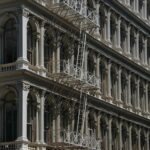 New York old building facade with fire stairs