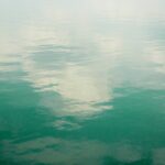 Quiet Rippling Green Clouds Reflecting Water