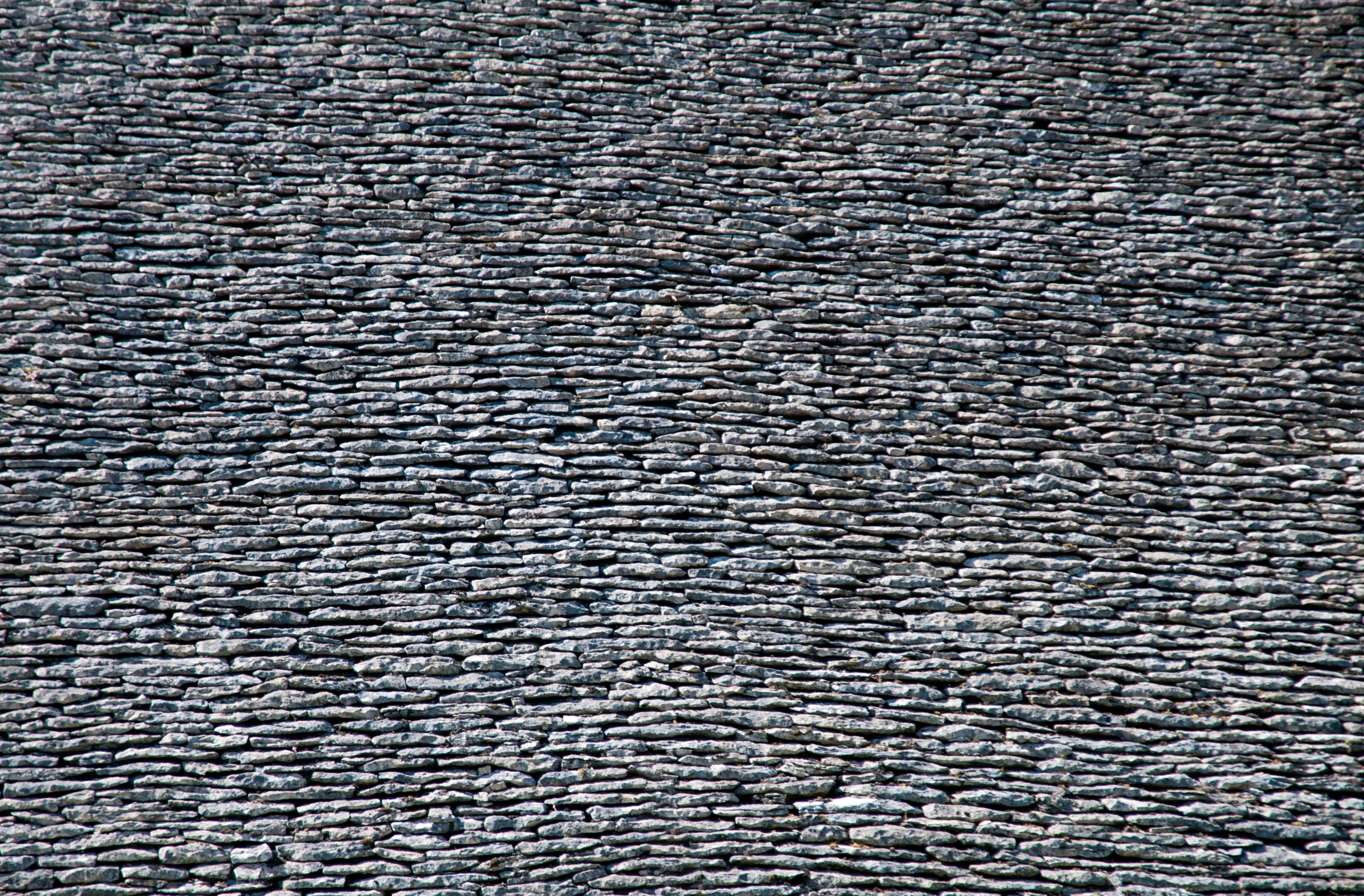 Stacked stone roof tiles texture