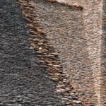 Stone stacked bricked layers roof background