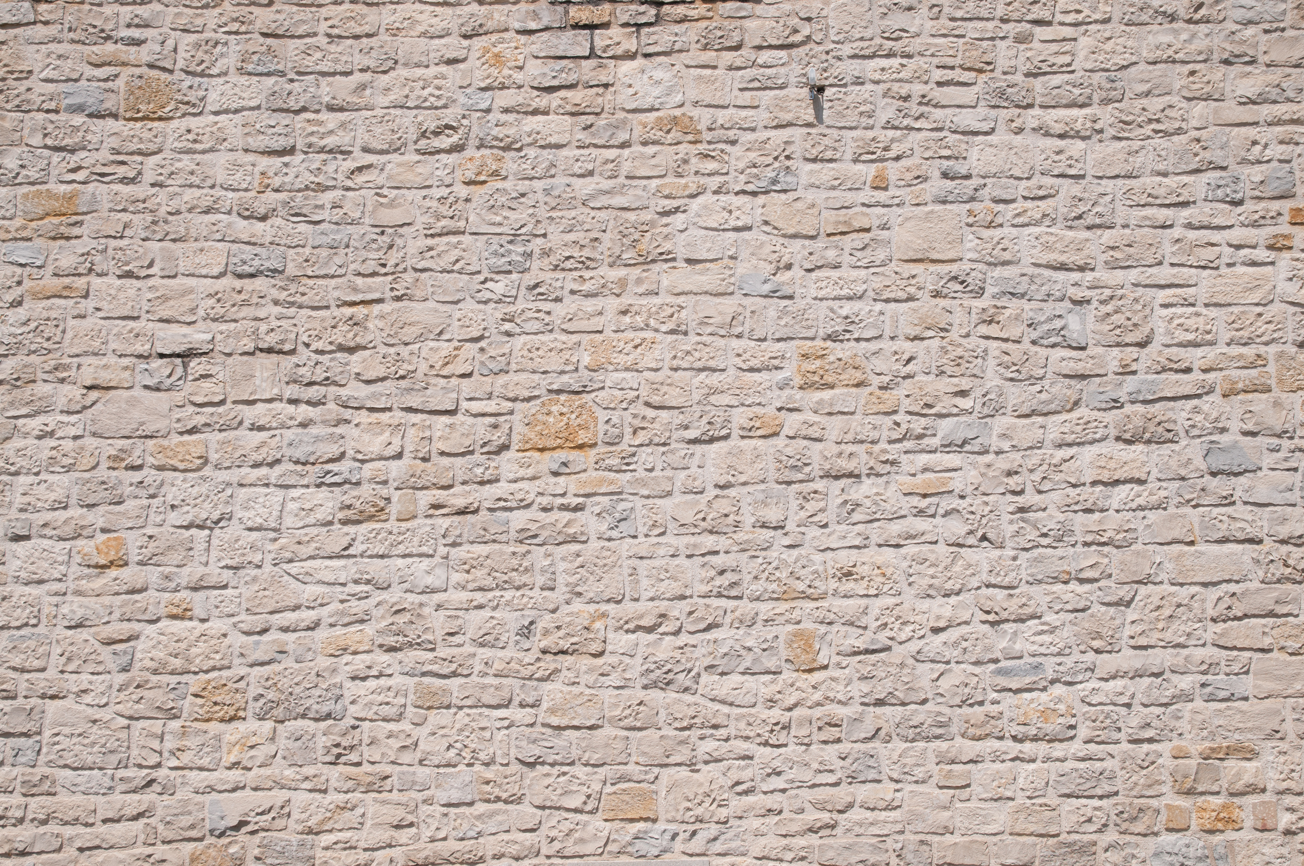 Stone wall wave pattern