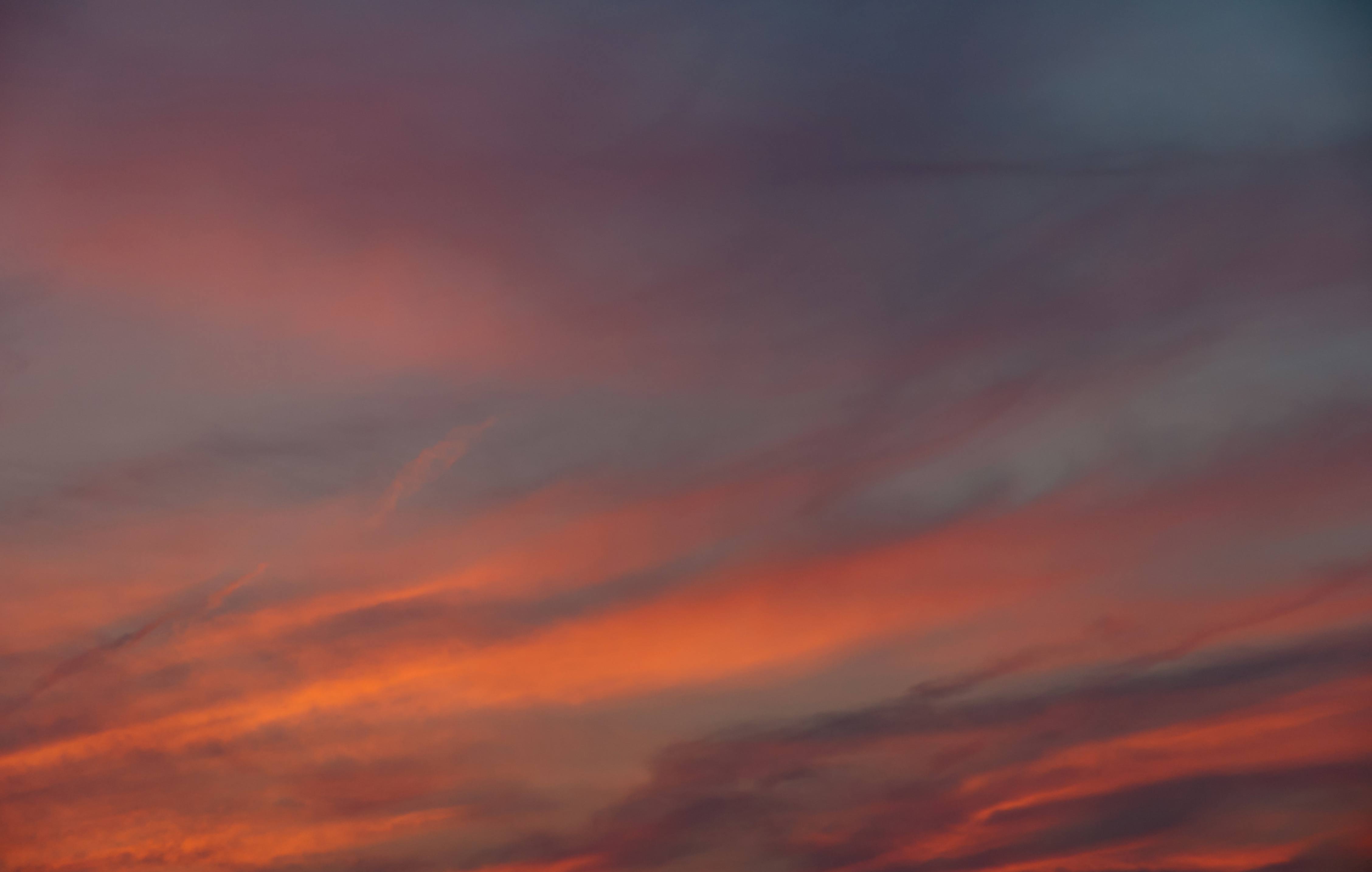 Striped Orange Glowing Cloudy Sunset