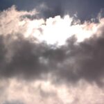 Sunburst behind the dark clouds