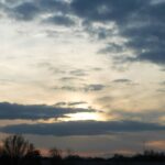 Sunrise glow and grey sky