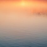 Sunset water reflection golden hour light