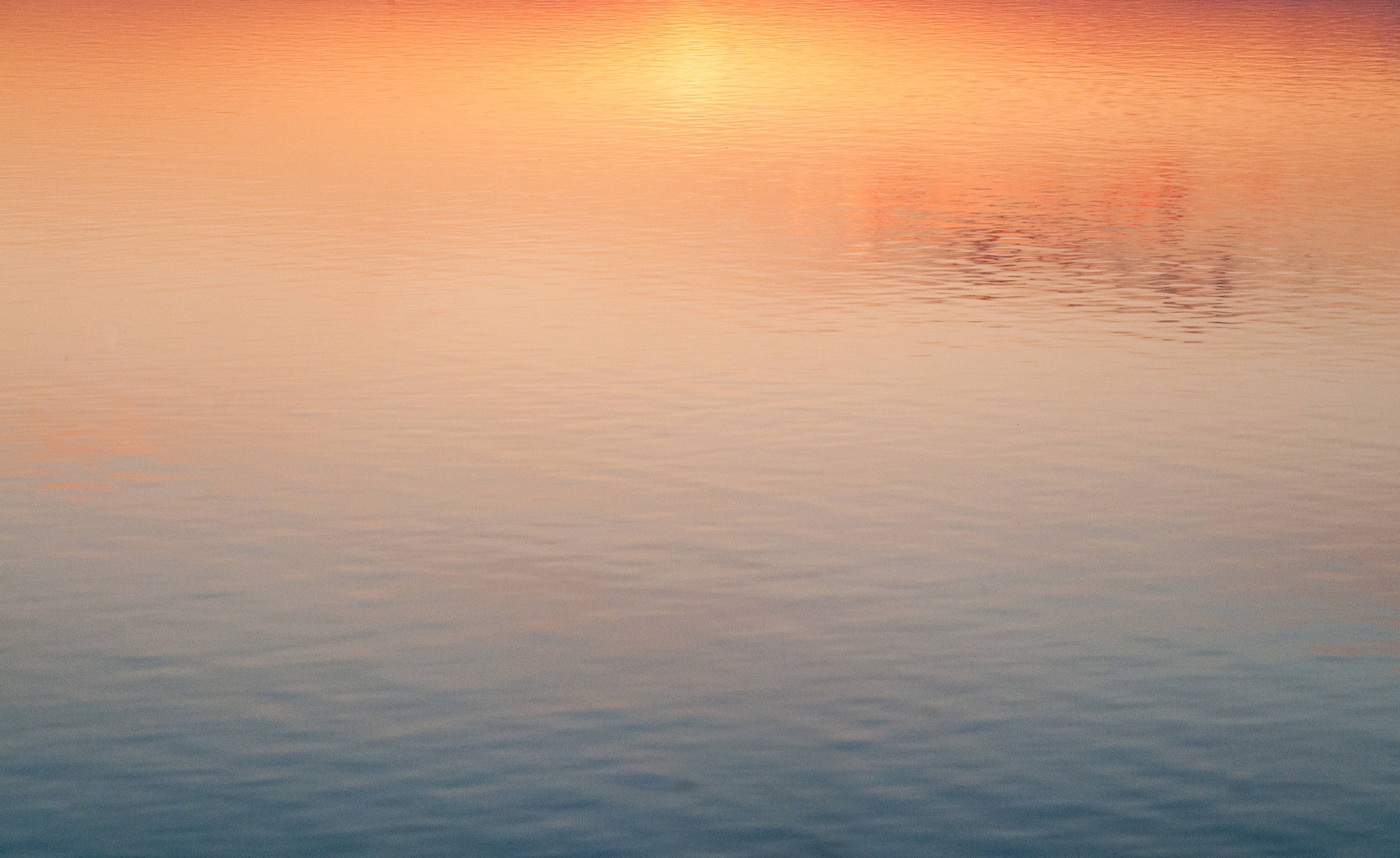 Sunset water reflection golden hour light