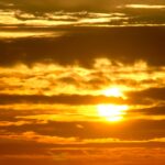 Warm Orange Red Sunset Sky and Clouds