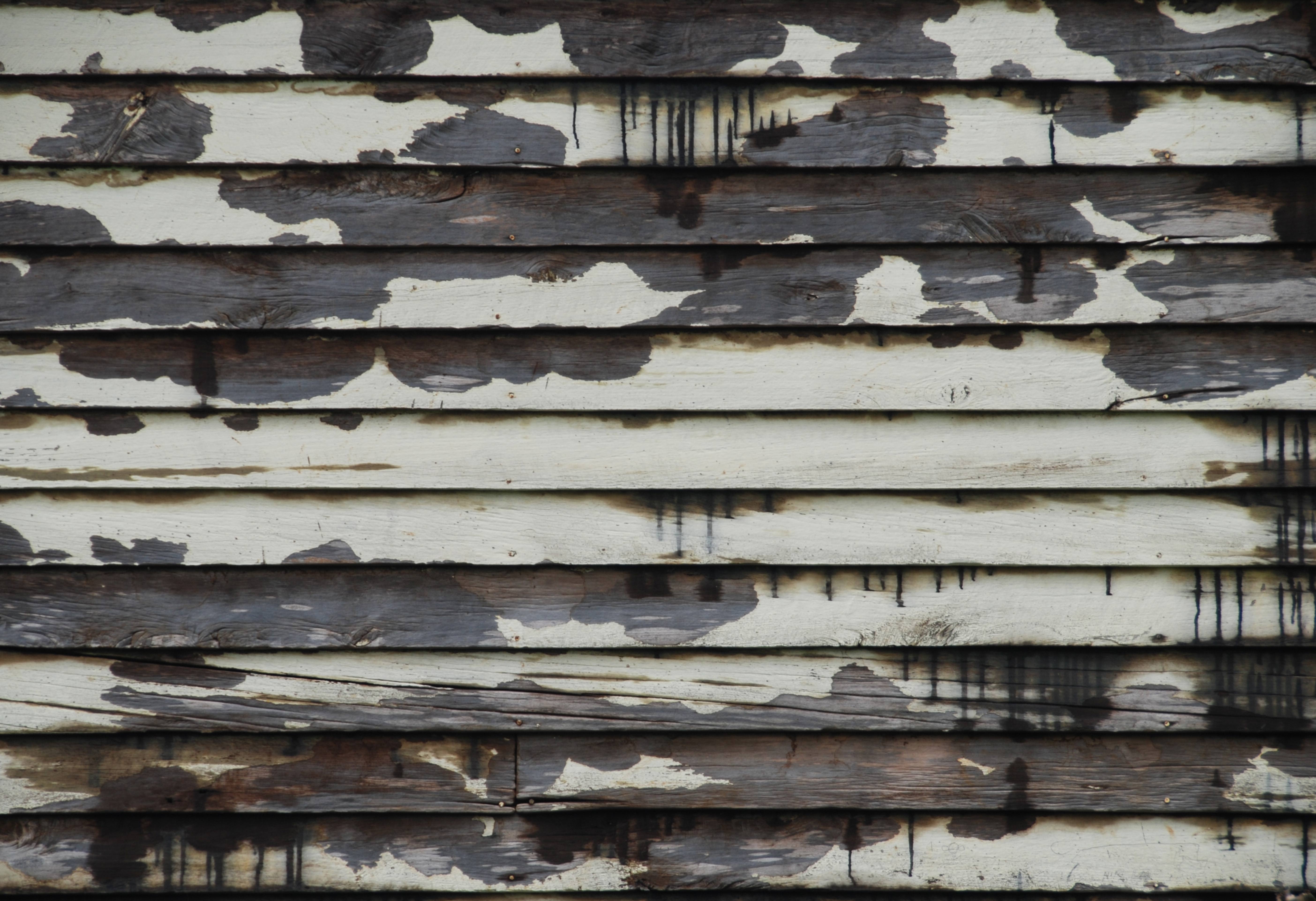 Wooden Panels with White Peeling Paint