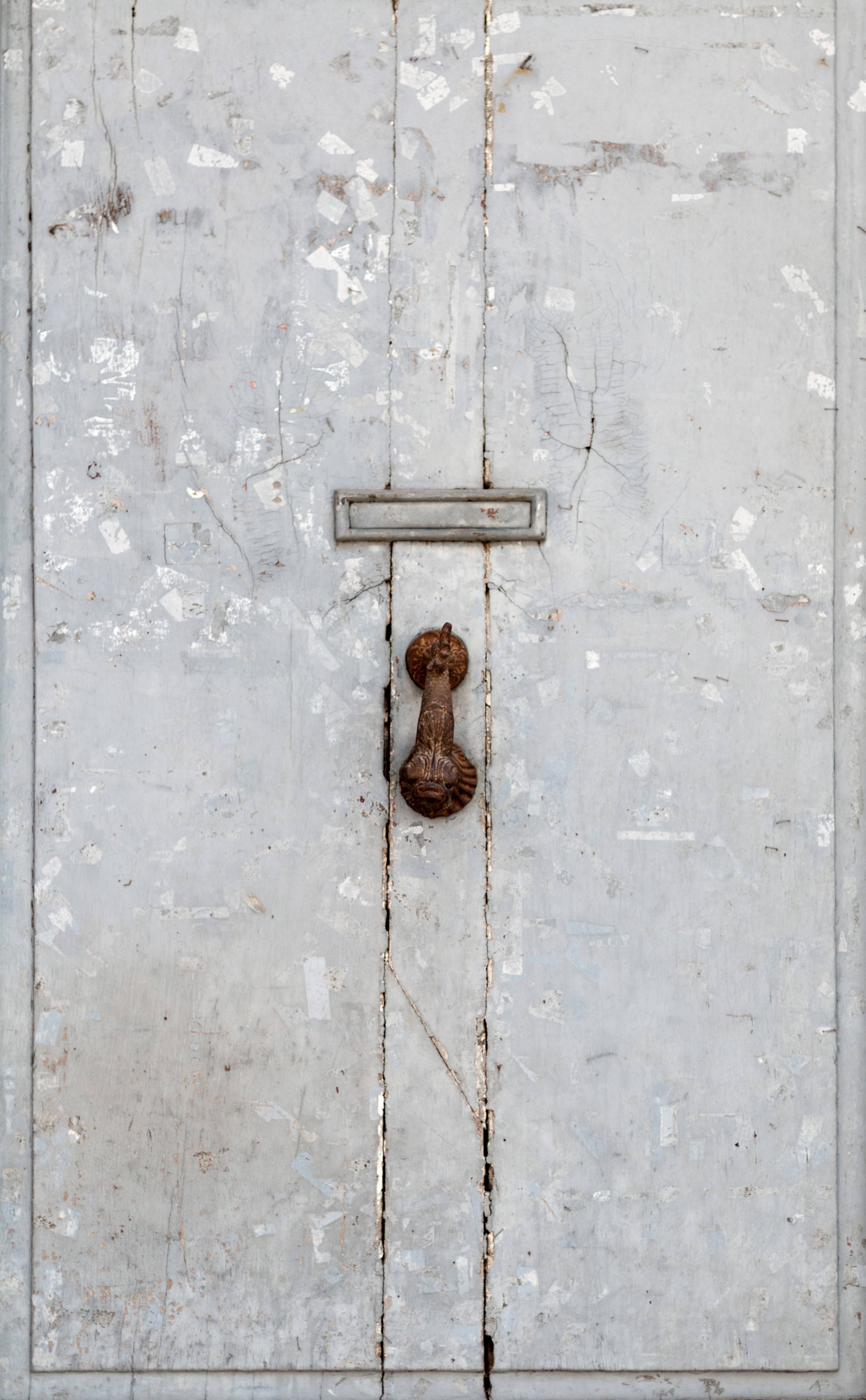Metal door and rusty knob
