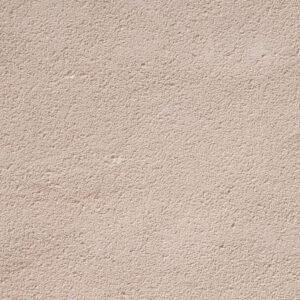 Subtle grain plaster wall close-up