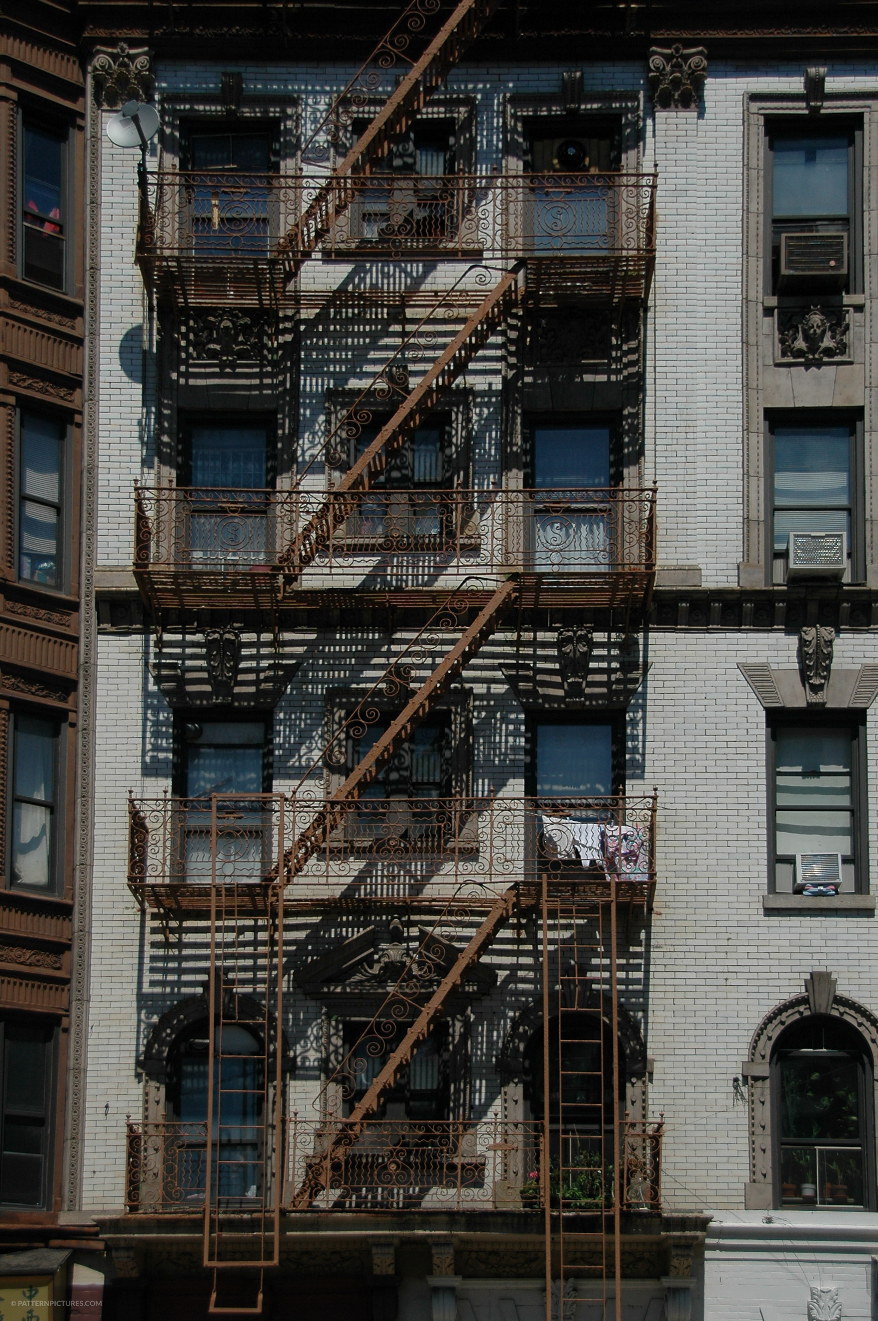 Fire ladder at old houses downtown in New York
