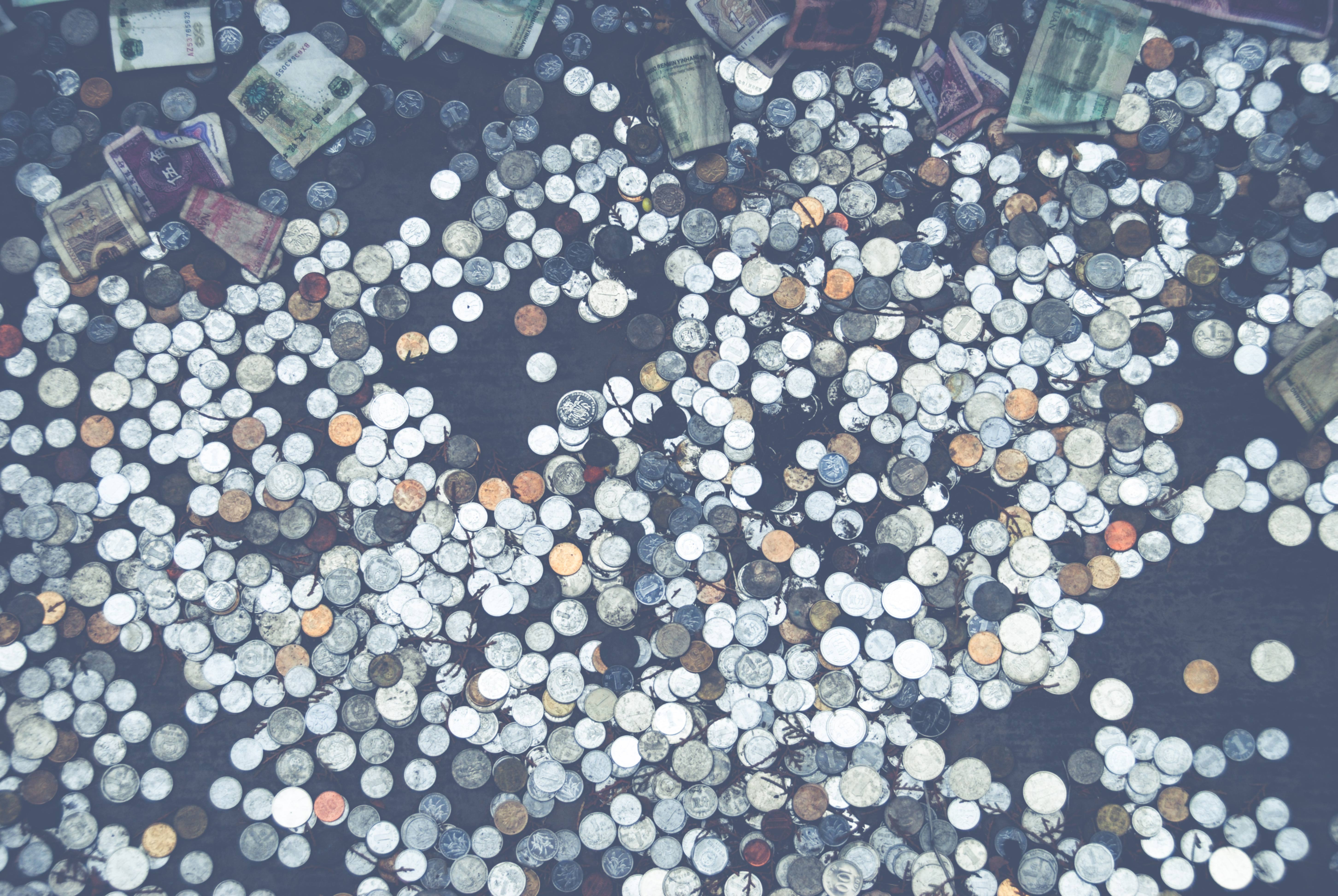 Money coins wishing well