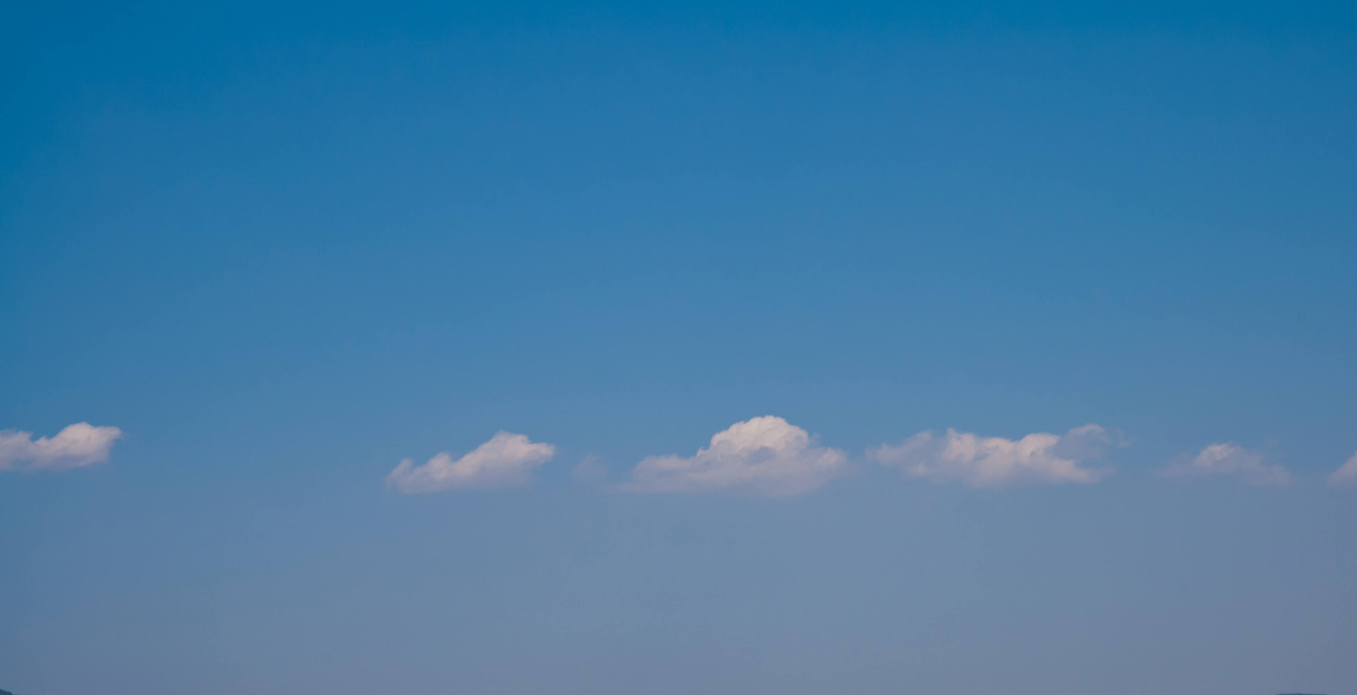 Blue sky and a cloudy line background