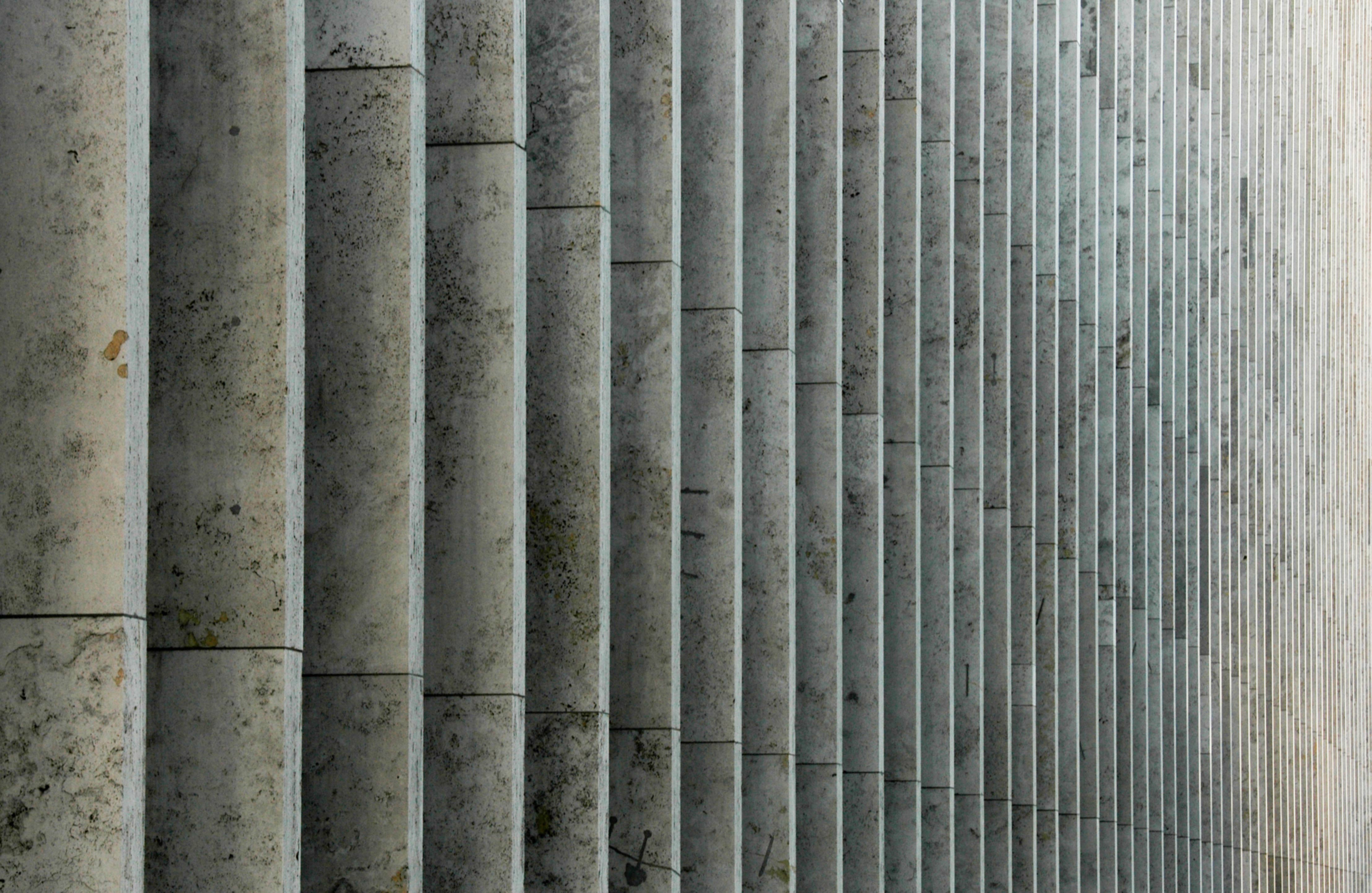 Stone pilars wall background