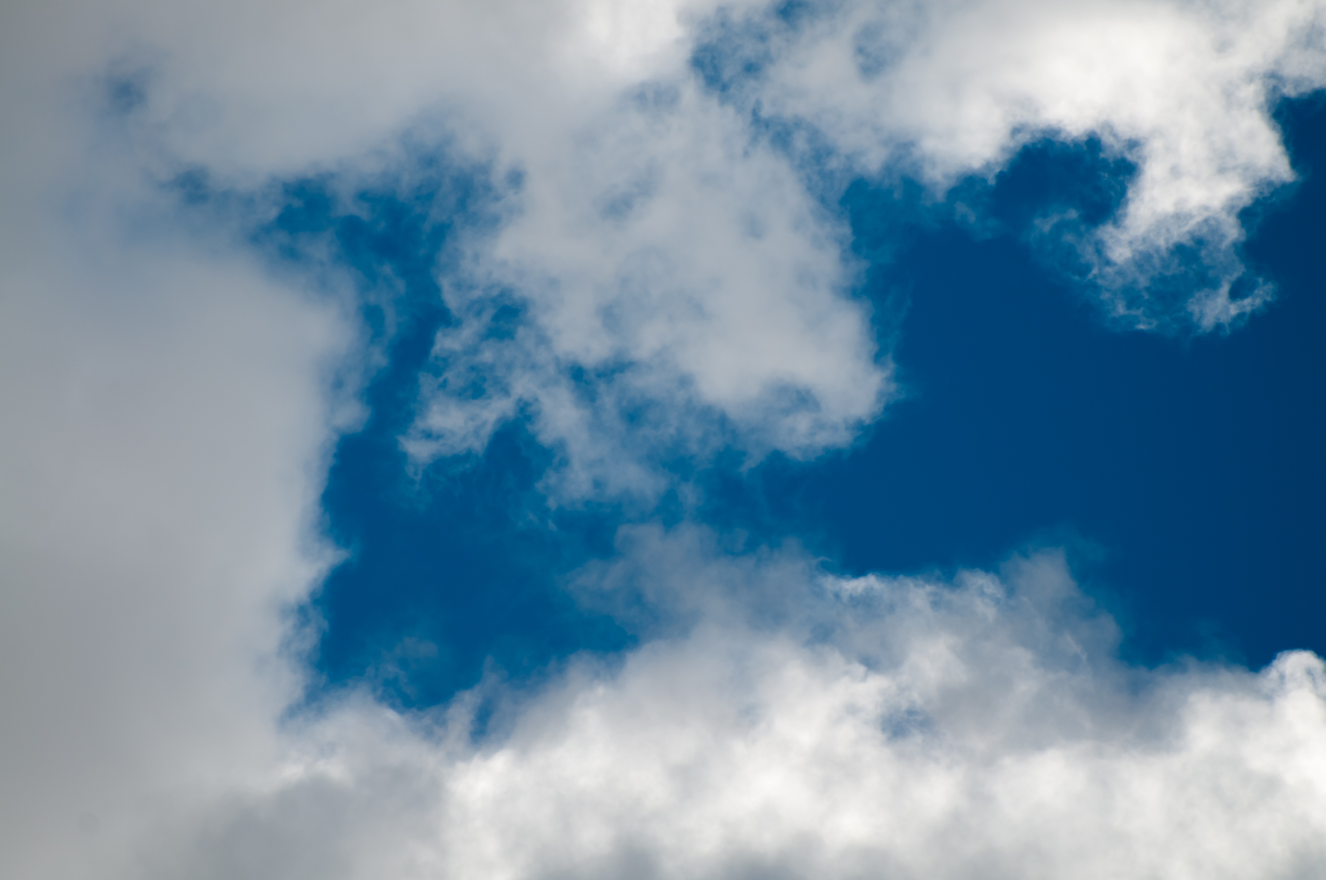 Blue sky clouds opening