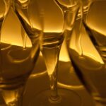 Glasses of Wine in Yellow Light