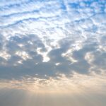 Sun Rays through the Mid-Level Clouds