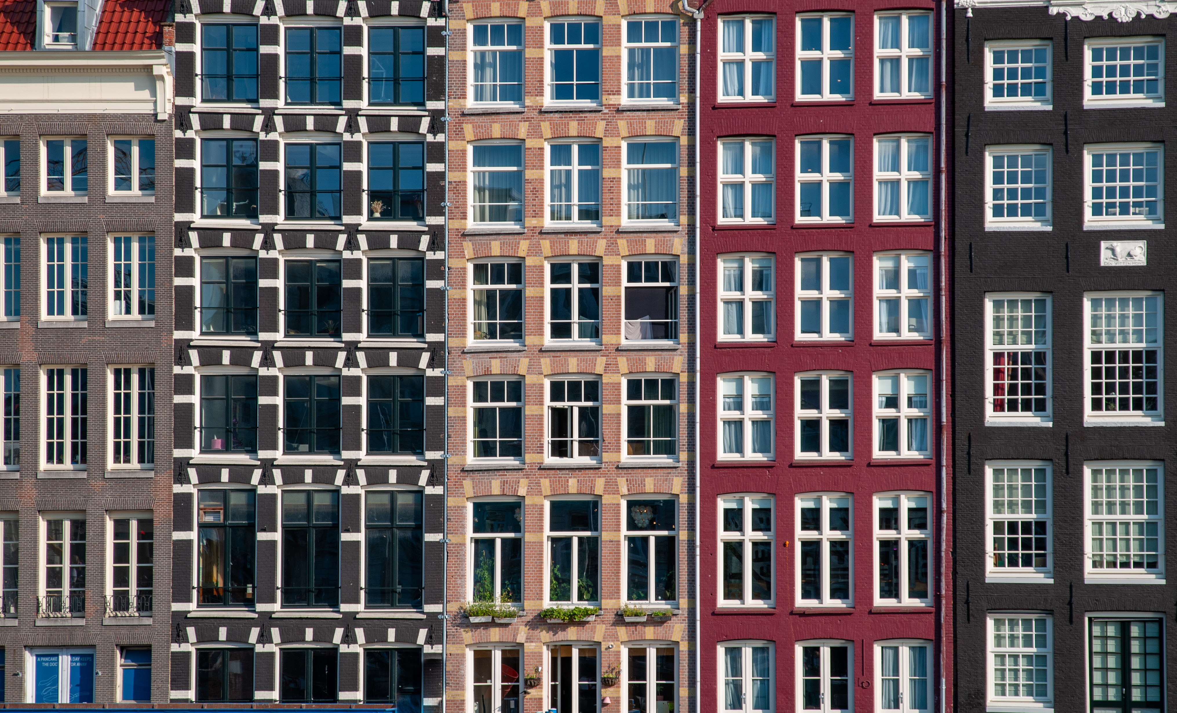 Amsterdam canal houses windows Damrak