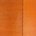 Corten steel plates background and bolts
