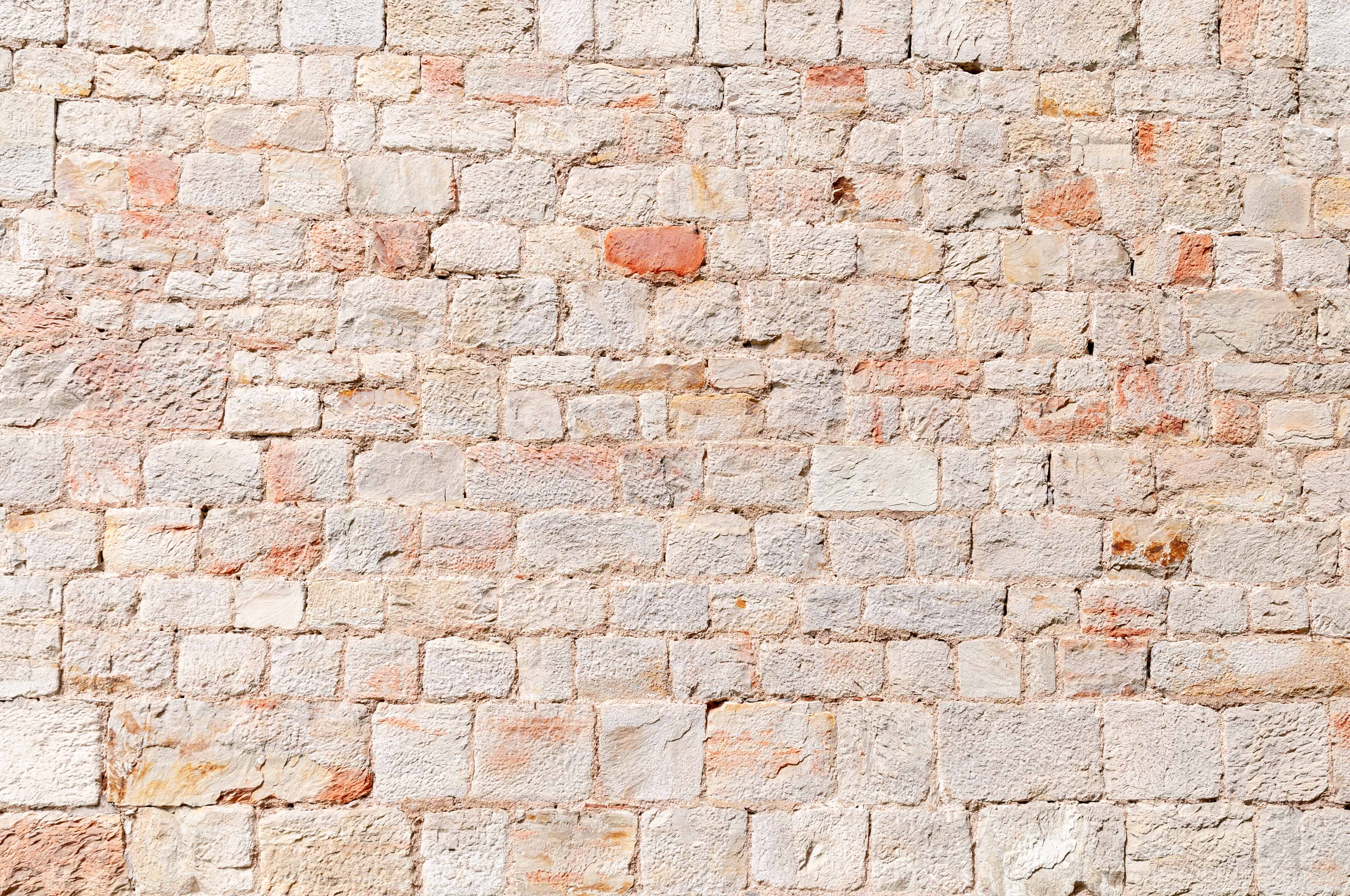 Light mediterranean rock stone wall pattern