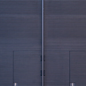 Architecture dark grey striped doors