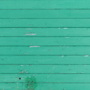 Eroded green wooden door landscape orientation